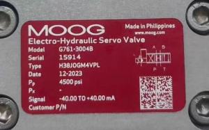 Nameplate of Moog electro-hydraulic servo valve G761-3004B, type H38JOGM4VPL, serial 15914, dated 12-2023, made in Philippines, rated 4500 psi supply and -40 to +40 mA command signal